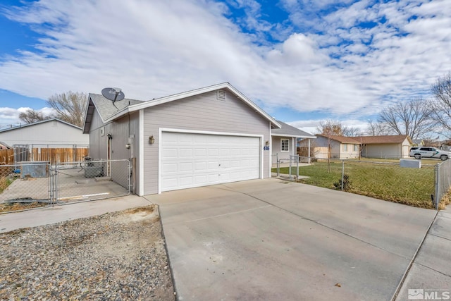 ranch-style house featuring a garage