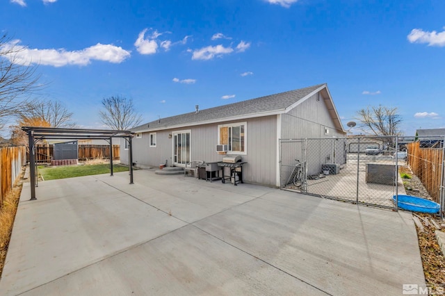 back of property with a patio