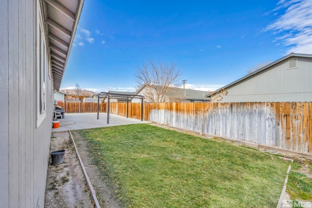 view of yard featuring a patio area and a pergola