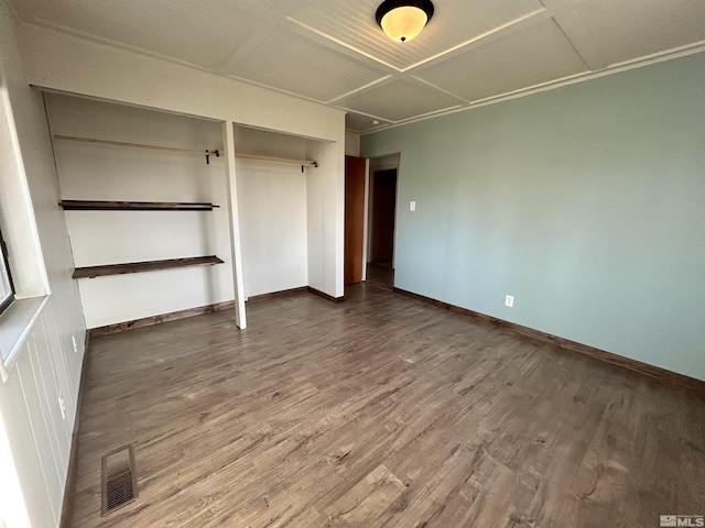 unfurnished bedroom with hardwood / wood-style floors