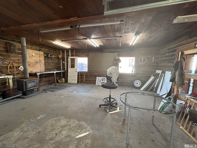 basement featuring a wood stove