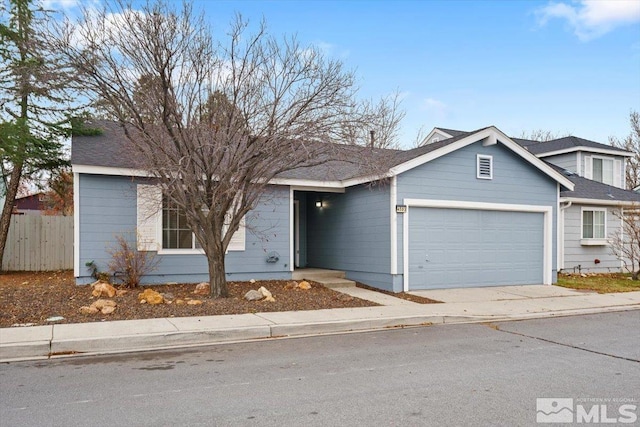 ranch-style home with a garage