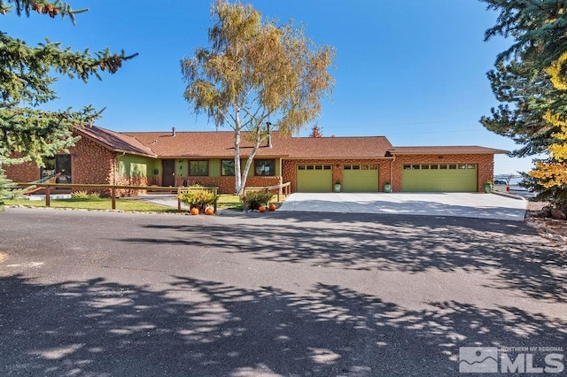 ranch-style house with a garage