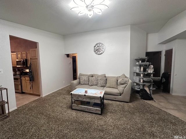 carpeted living room featuring a textured ceiling