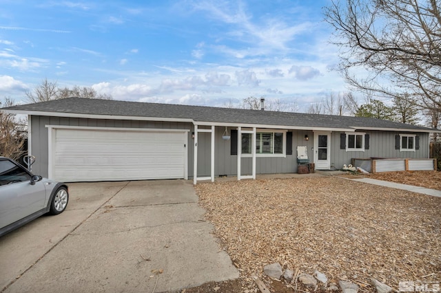 ranch-style home featuring a garage