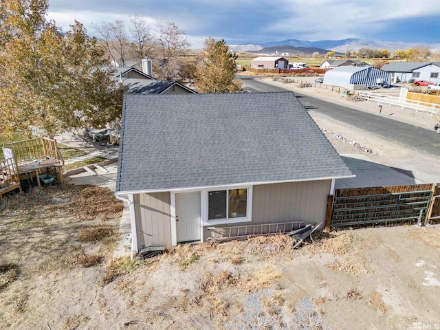 view of home's exterior with a mountain view