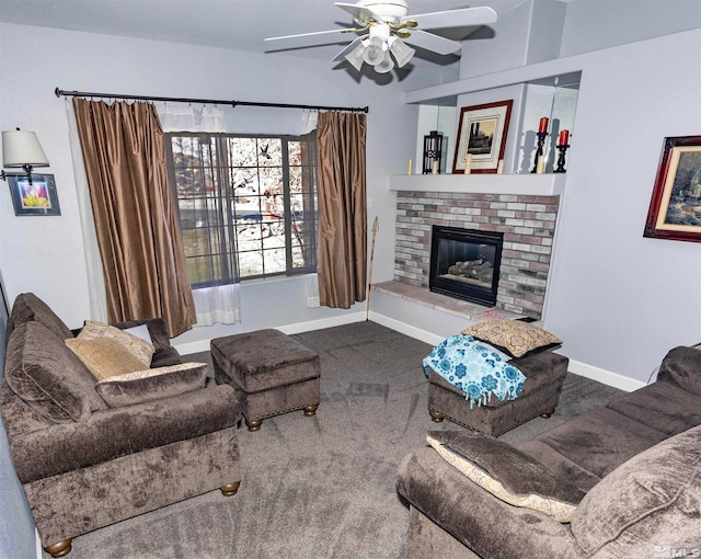 living room featuring ceiling fan, a fireplace, and carpet