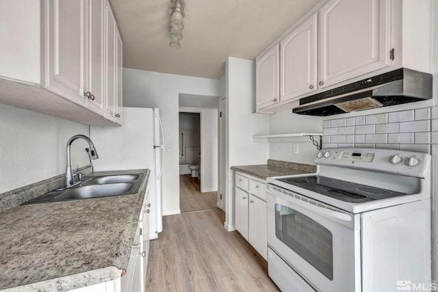 kitchen with sink, white range with electric stovetop, light hardwood / wood-style floors, decorative backsplash, and white cabinets