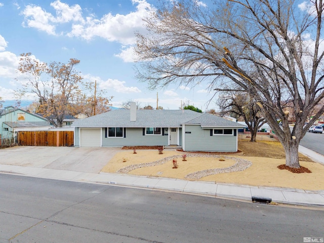 ranch-style house featuring a garage