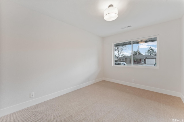 spare room with carpet flooring