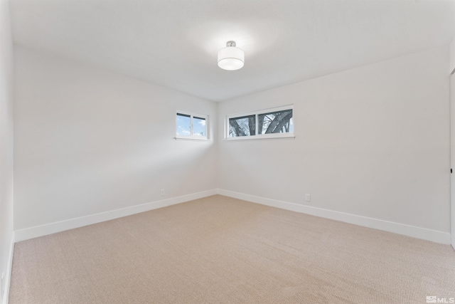 spare room with carpet flooring