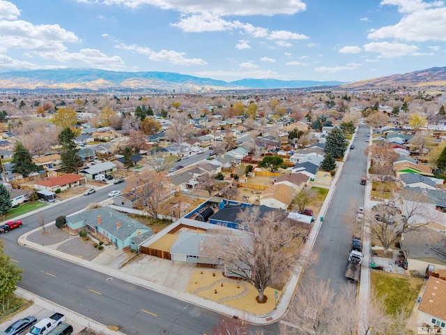 drone / aerial view featuring a mountain view