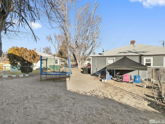 view of yard with a trampoline