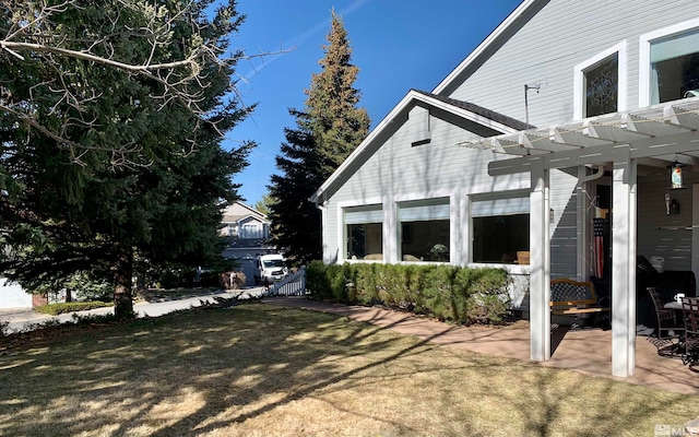 view of yard with a pergola