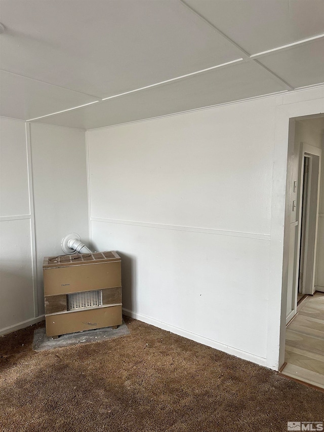 spare room featuring carpet flooring