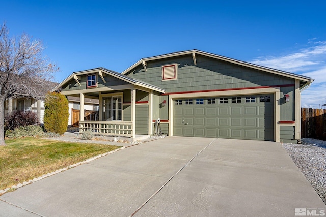 view of front facade with a garage and covered porch