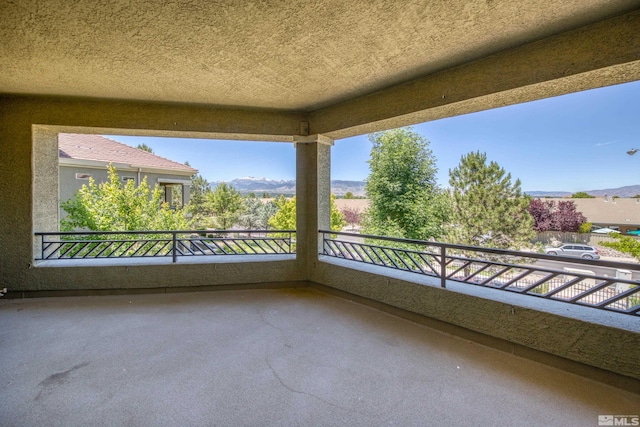 balcony featuring a mountain view