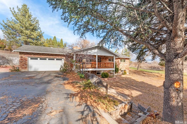 single story home featuring a garage