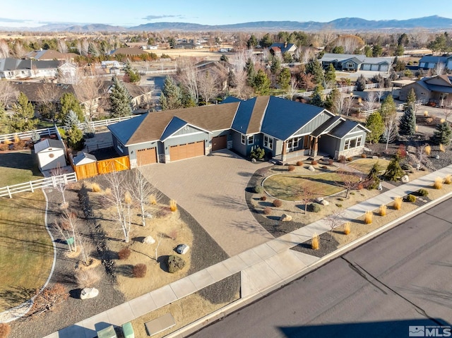 drone / aerial view featuring a mountain view