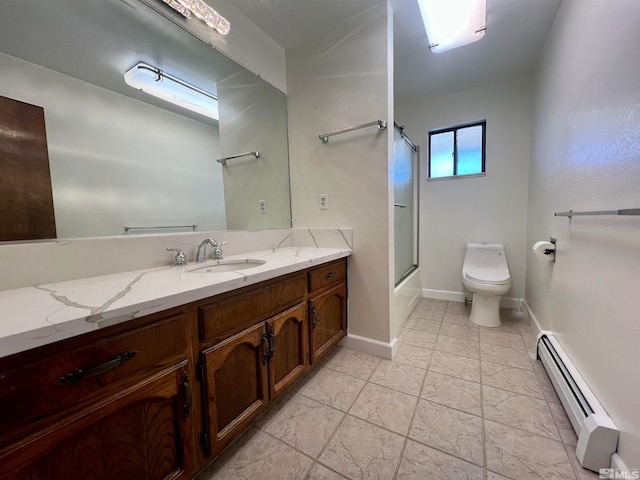 full bathroom featuring bath / shower combo with glass door, vanity, a baseboard radiator, and toilet