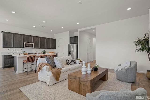 living room with light wood-type flooring