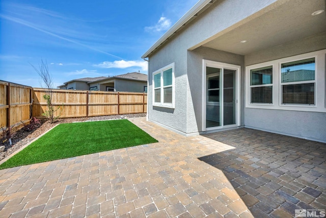 view of patio with a fenced backyard