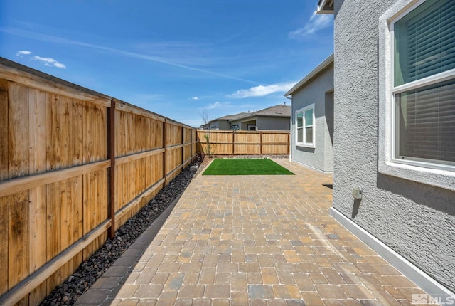 view of patio featuring a fenced backyard