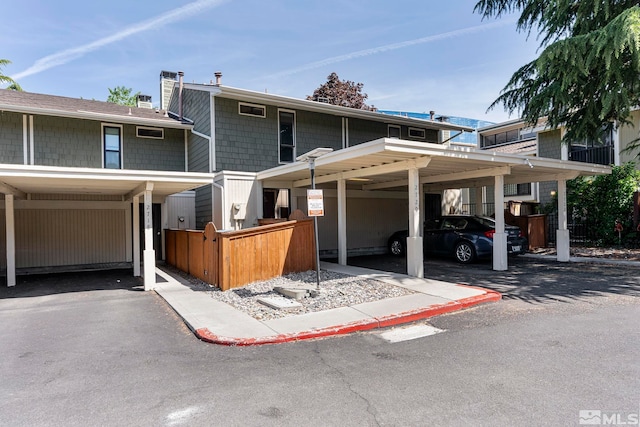 view of front facade featuring a carport