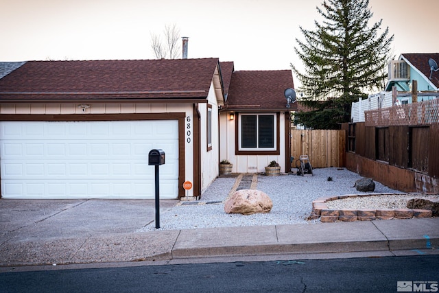 ranch-style home with a garage