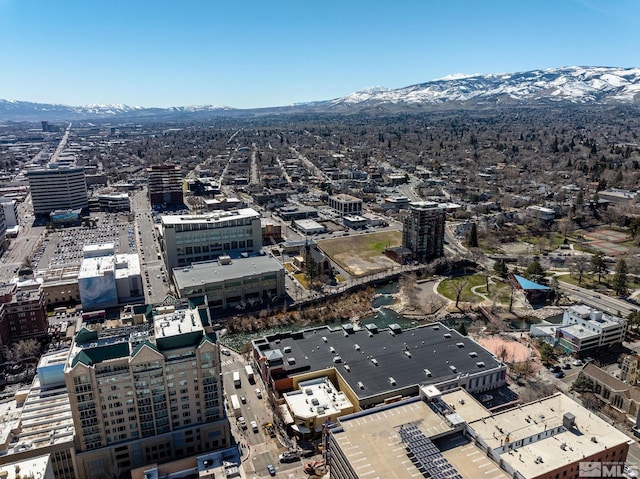 drone / aerial view featuring a mountain view