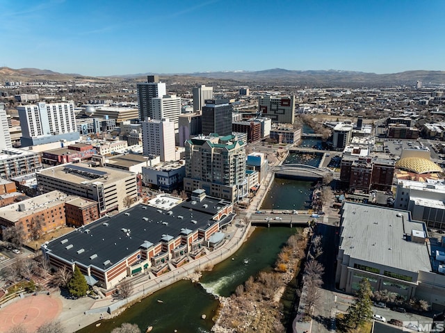 property's view of city featuring a mountain view