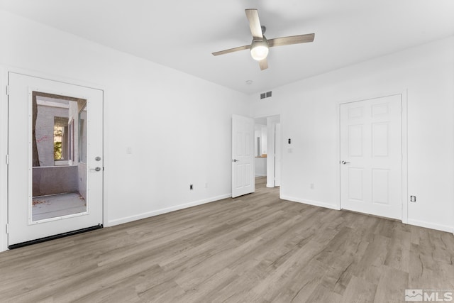 unfurnished bedroom featuring ceiling fan and light hardwood / wood-style floors