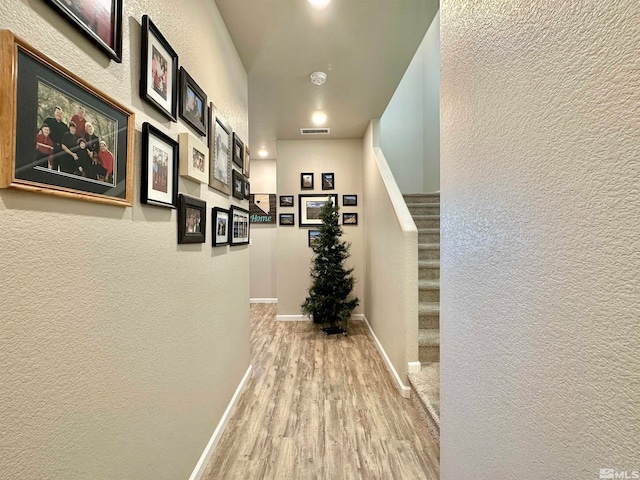 hall featuring light wood-type flooring