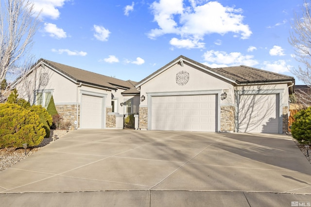 ranch-style home featuring a garage