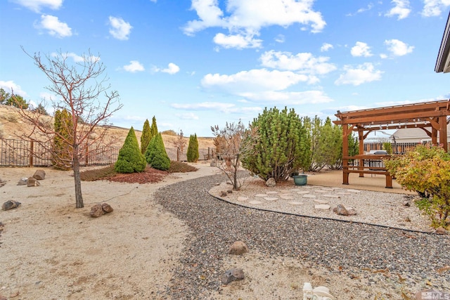 view of yard with a pergola