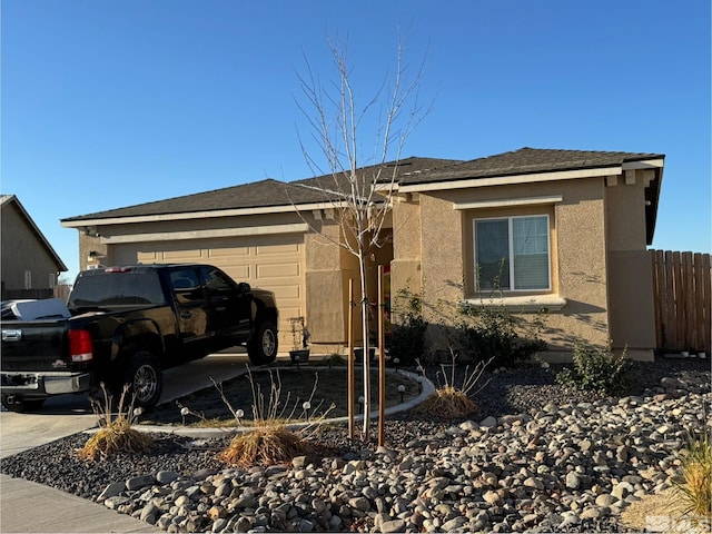 view of side of home with a garage