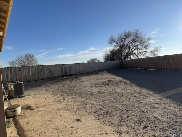 view of yard featuring central AC