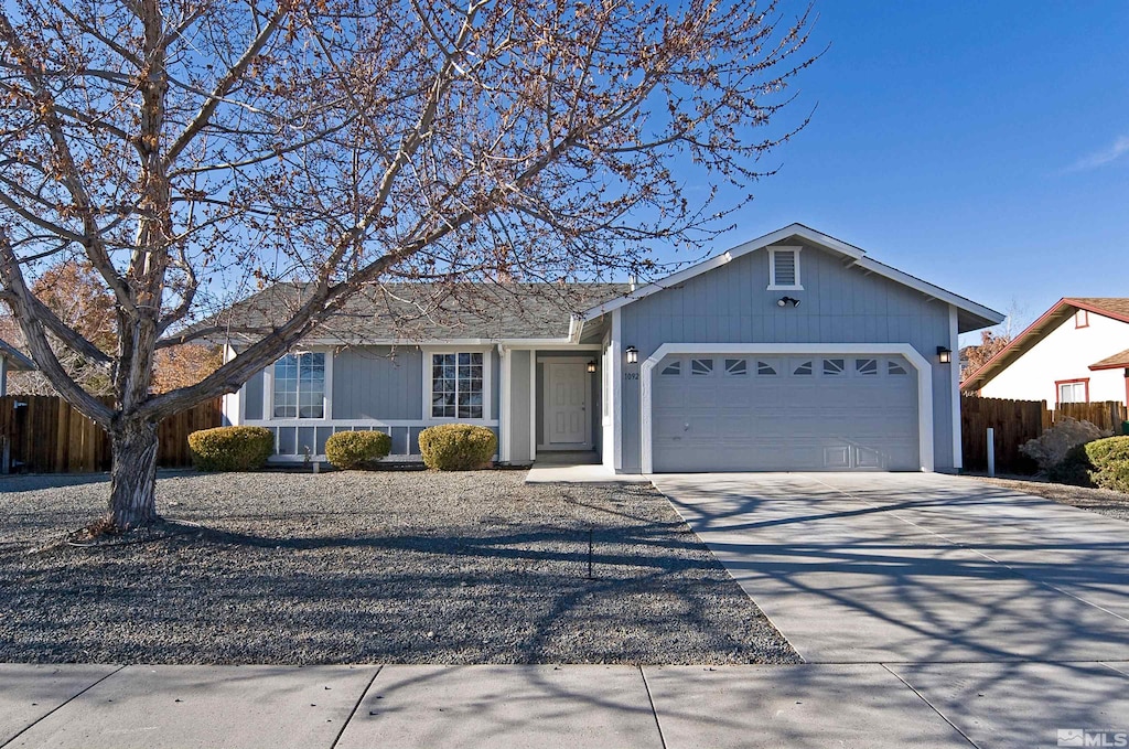 single story home with a garage