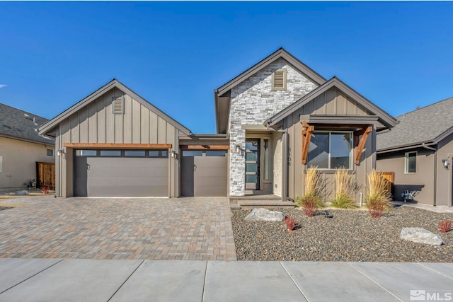 modern inspired farmhouse featuring a garage