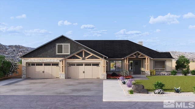 craftsman house featuring a mountain view and a garage