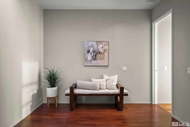 living area featuring dark hardwood / wood-style flooring