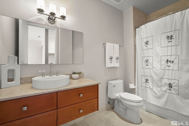 bathroom with a shower with curtain, tile patterned flooring, vanity, and toilet