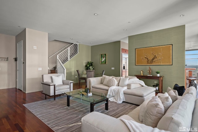 living room with dark hardwood / wood-style flooring