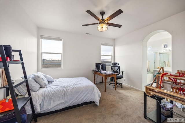 carpeted bedroom with ceiling fan