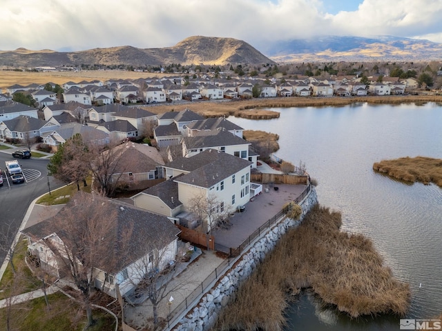 aerial view with a water and mountain view