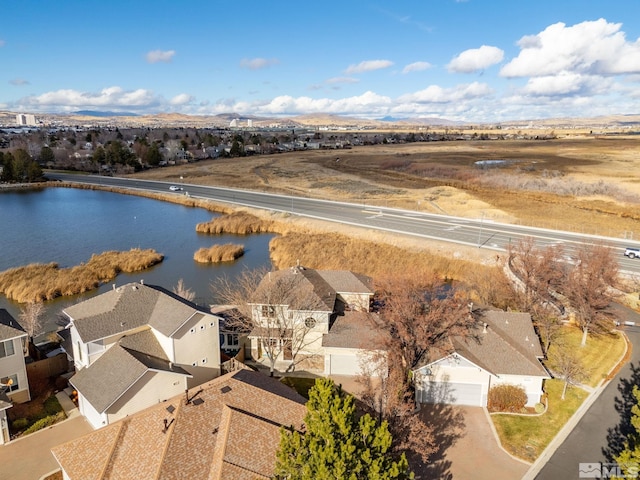 drone / aerial view with a water view