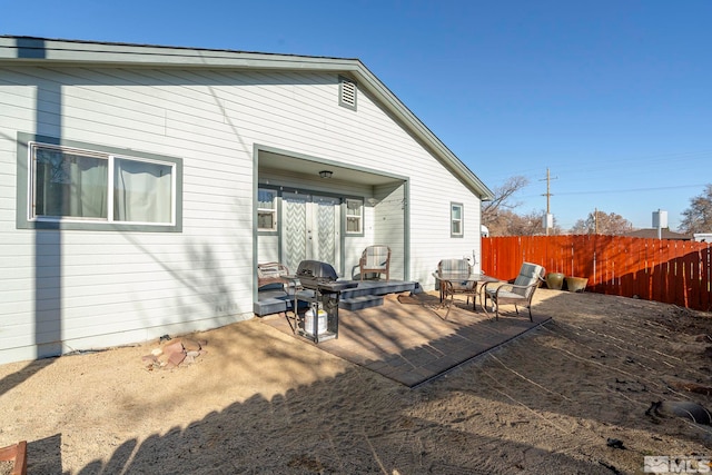 rear view of property with a patio area