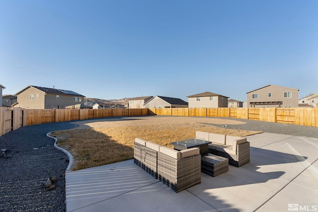 view of yard featuring a patio area and outdoor lounge area