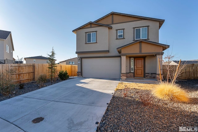 front of property with a garage