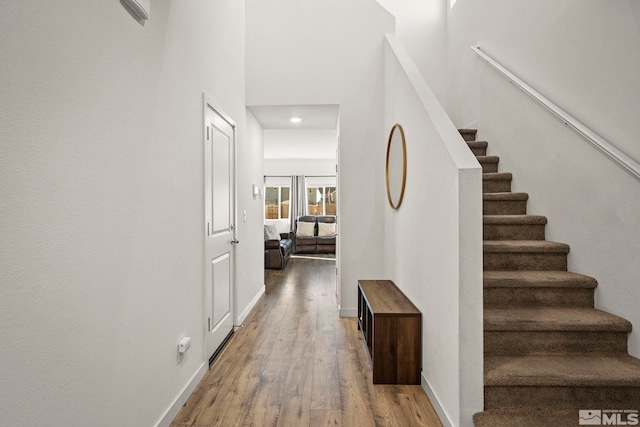 corridor featuring hardwood / wood-style flooring